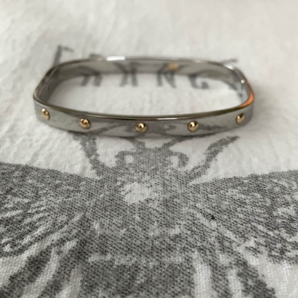 Stainless steel and 14 karat gold bracelet